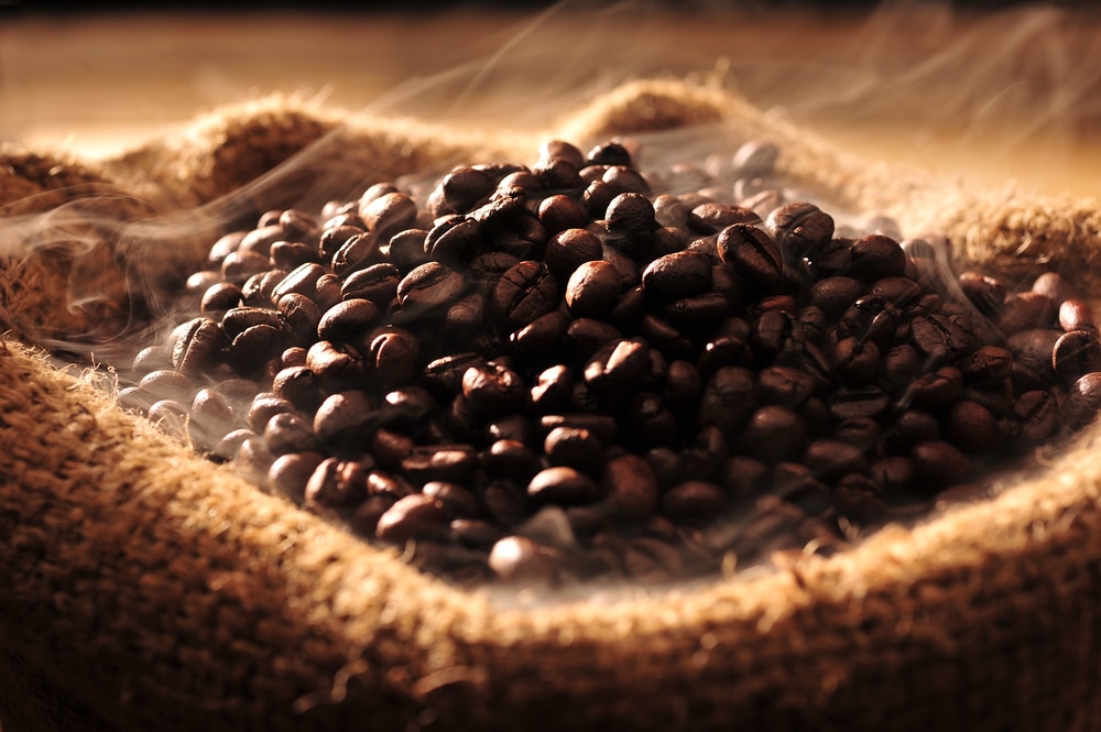 Coffee,Beans,With,Smoke,In,A,Bag.